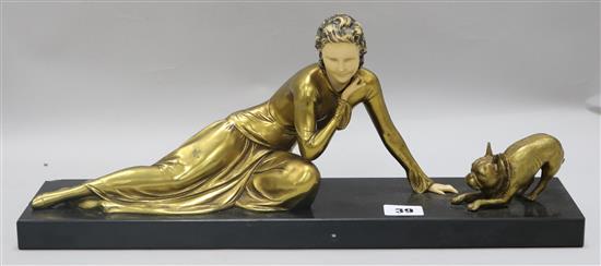 An Art Deco lady and dog figure group, on black marble base width 45cm height 19cm
